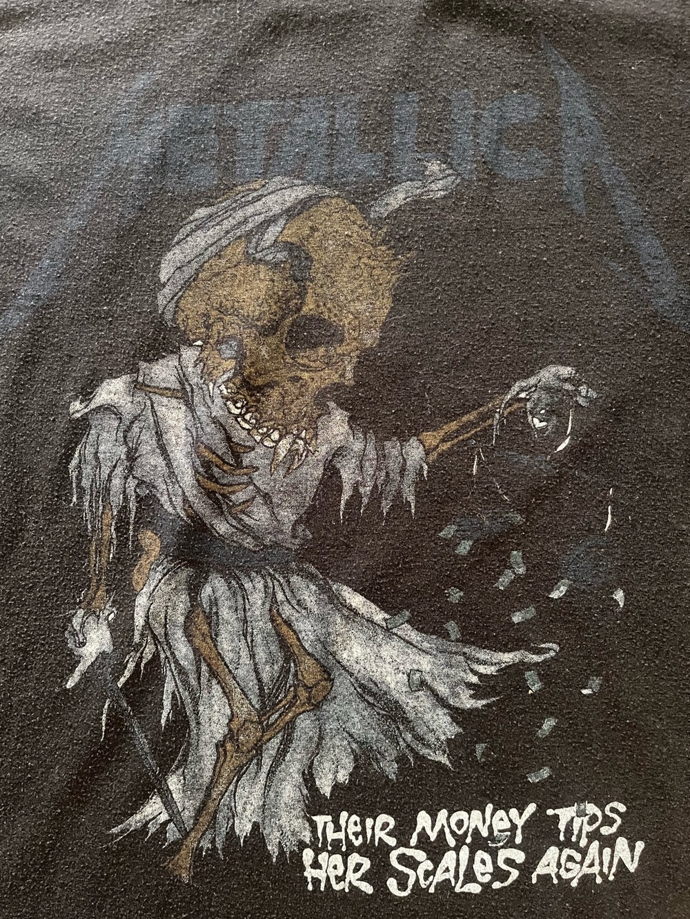 Metallica 2018 ‘Their Money Tips Her Scales Again’ Graphic Tee